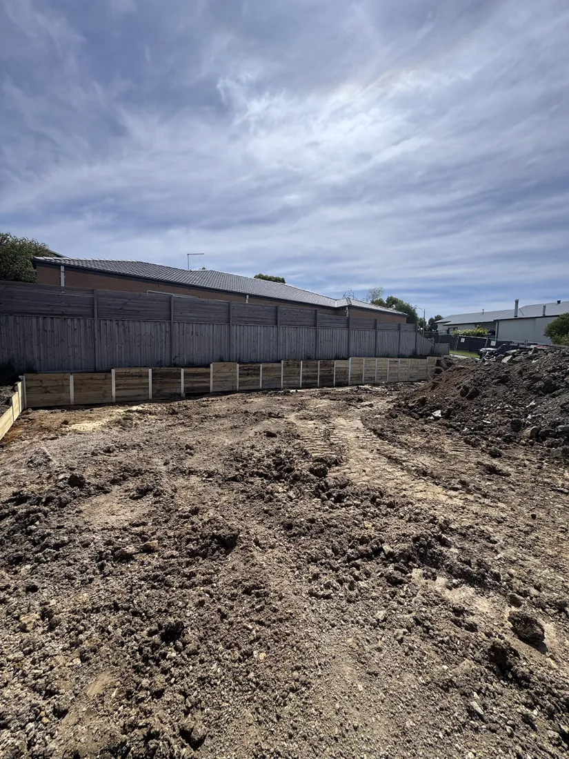 Completed dark sleeper retaining wall