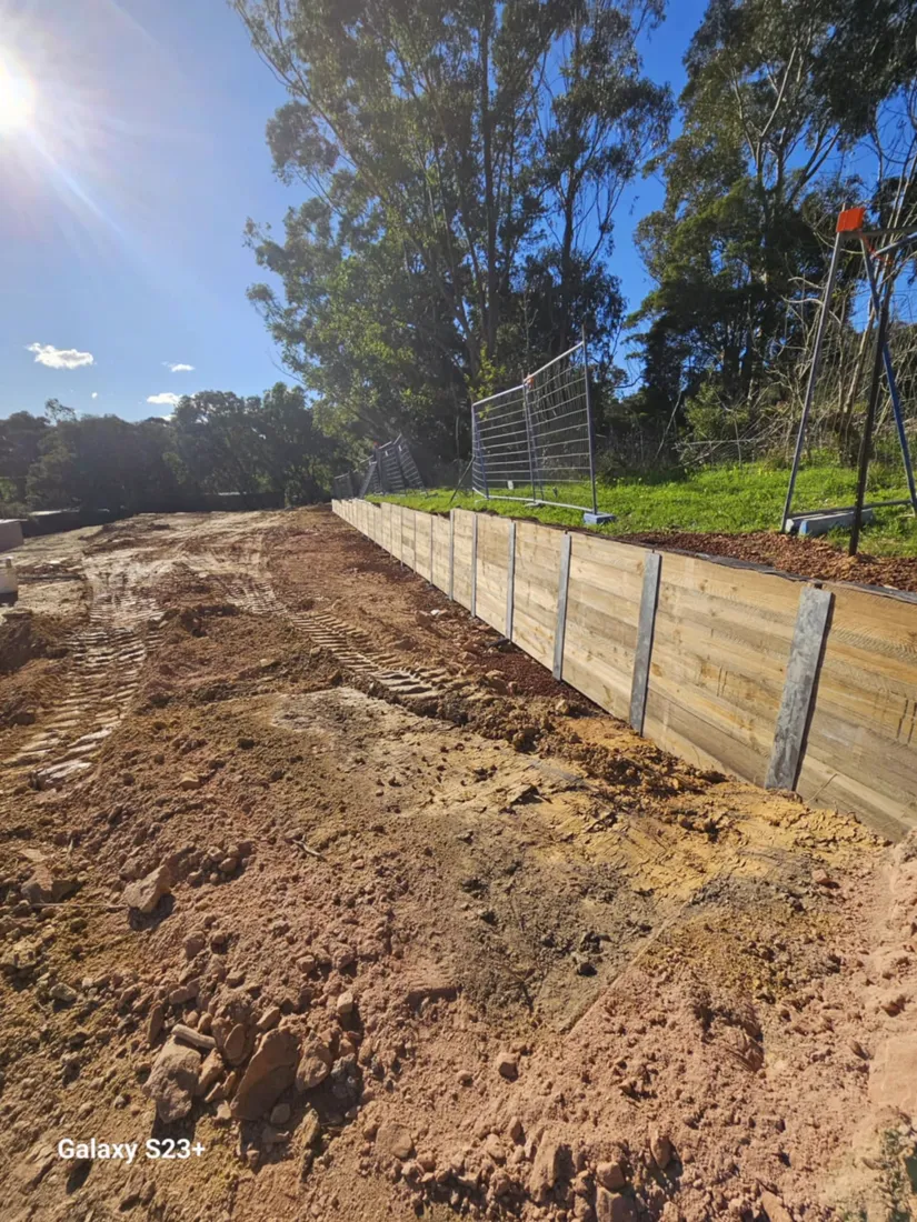 Completed timber-look sleeper retaining wall