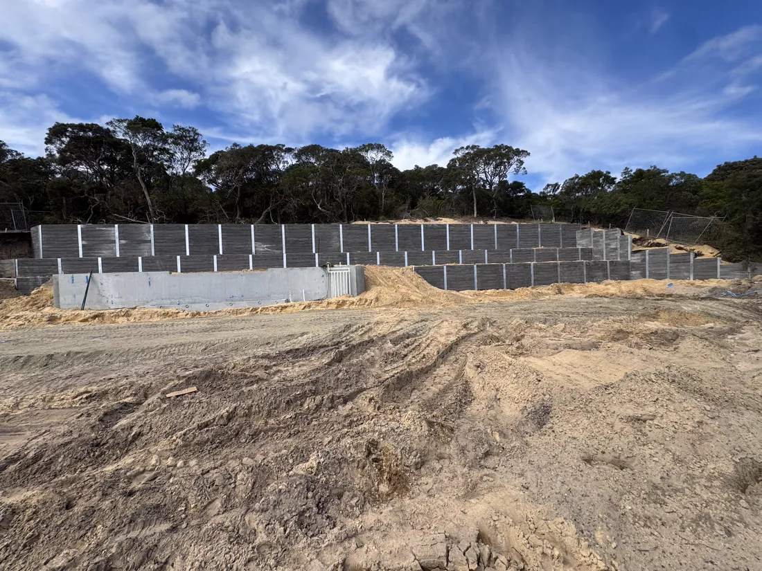 Completed multi-tier concrete block retaining wall